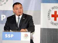 Genaro García Luna, titular de la Secretaría de Seguridad Pública federal, en conferencia de prensa en la que anunció un convenio con el Comité Internacional de la Cruz Roja