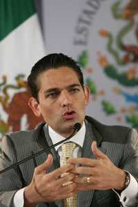 El secretario de Gobernación, Juan Camilo Mouriño, durante la conferencia