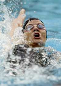 Kirsty Coventry durante su competencia de 200 metros dorso